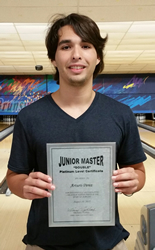 Arturo Perez with his Junior Master DOUBLE Platinum certificate